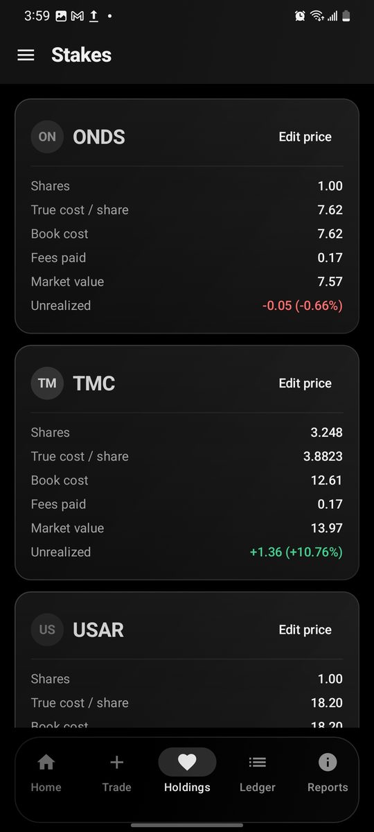Stakes holdings in dark mode with book cost and market value per position